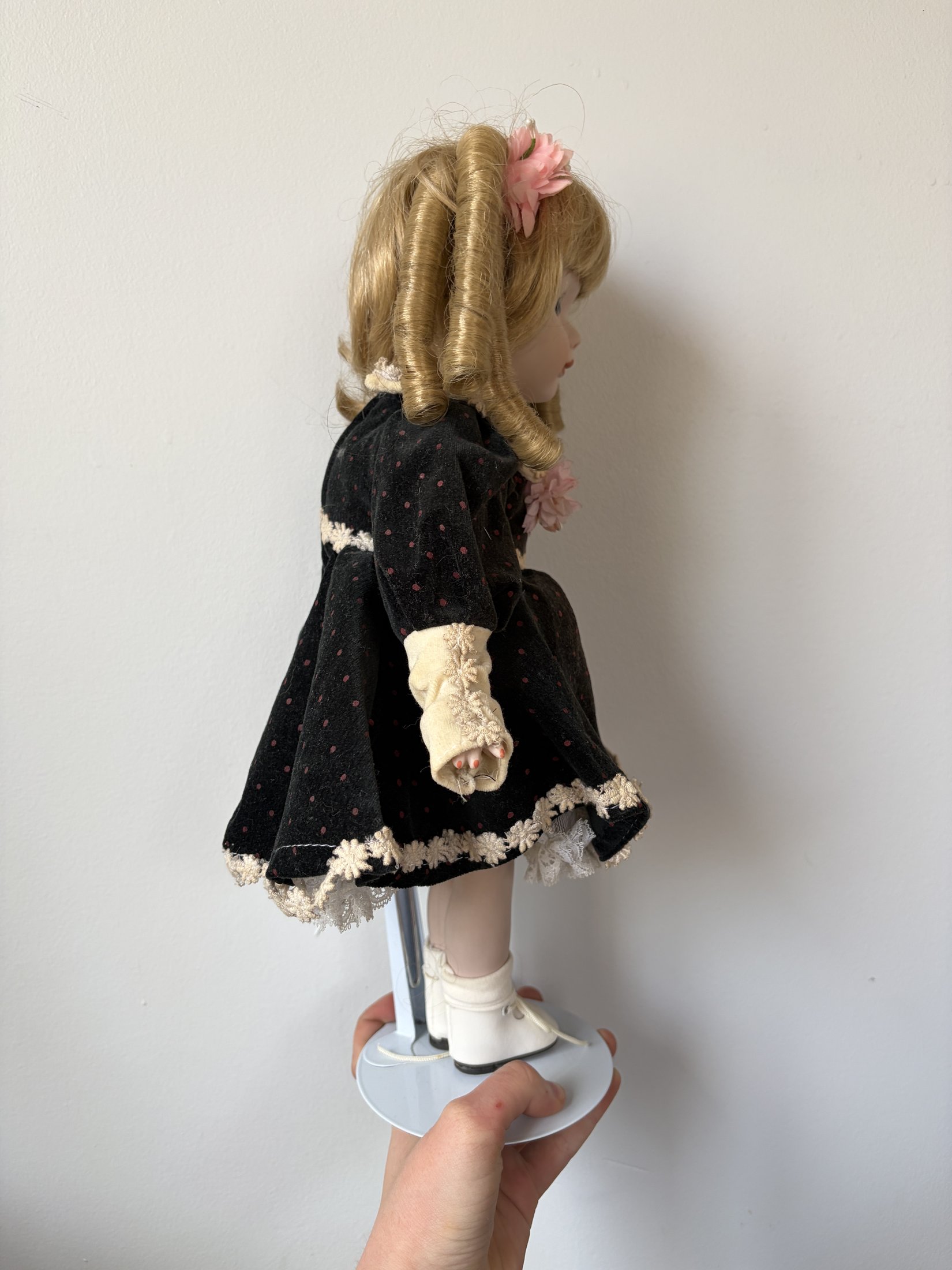 Vintage Porcelain Doll with Blonde Curls and Black Dress - Image 3