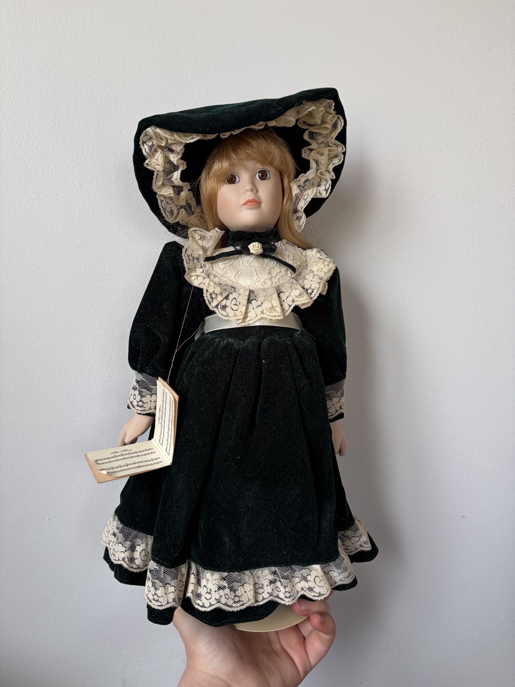 Ave Maria Porcelain Doll with Green Velvet Dress and Lace Trim - Image 2