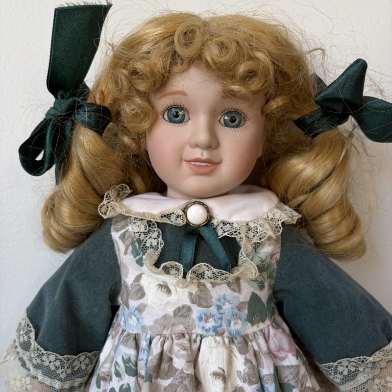 Blonde Curly Hair Porcelain Doll in Green Floral Dress 16″