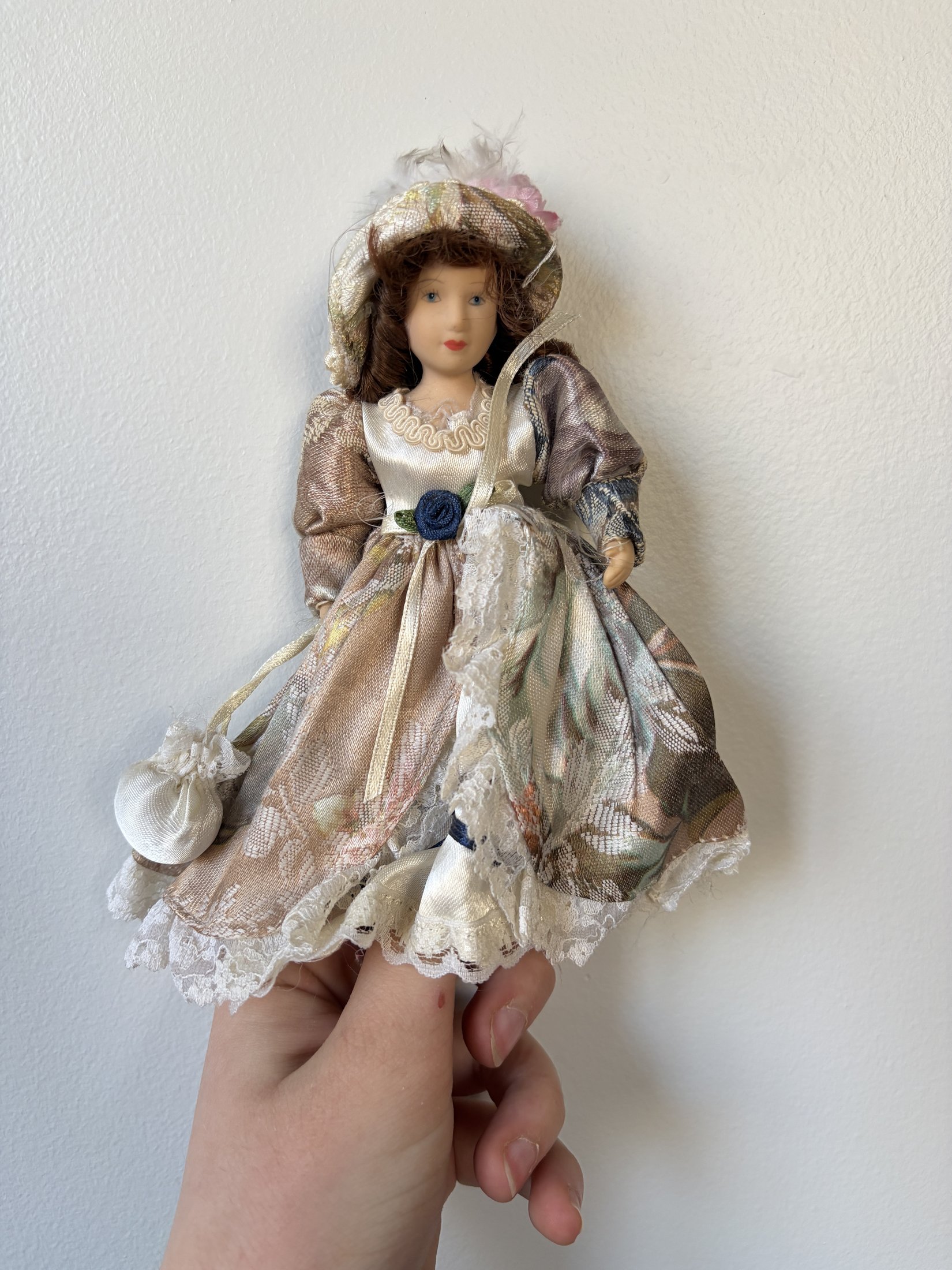 Vintage Porcelain Doll Collection in Victorian Dresses with Lace and Hats