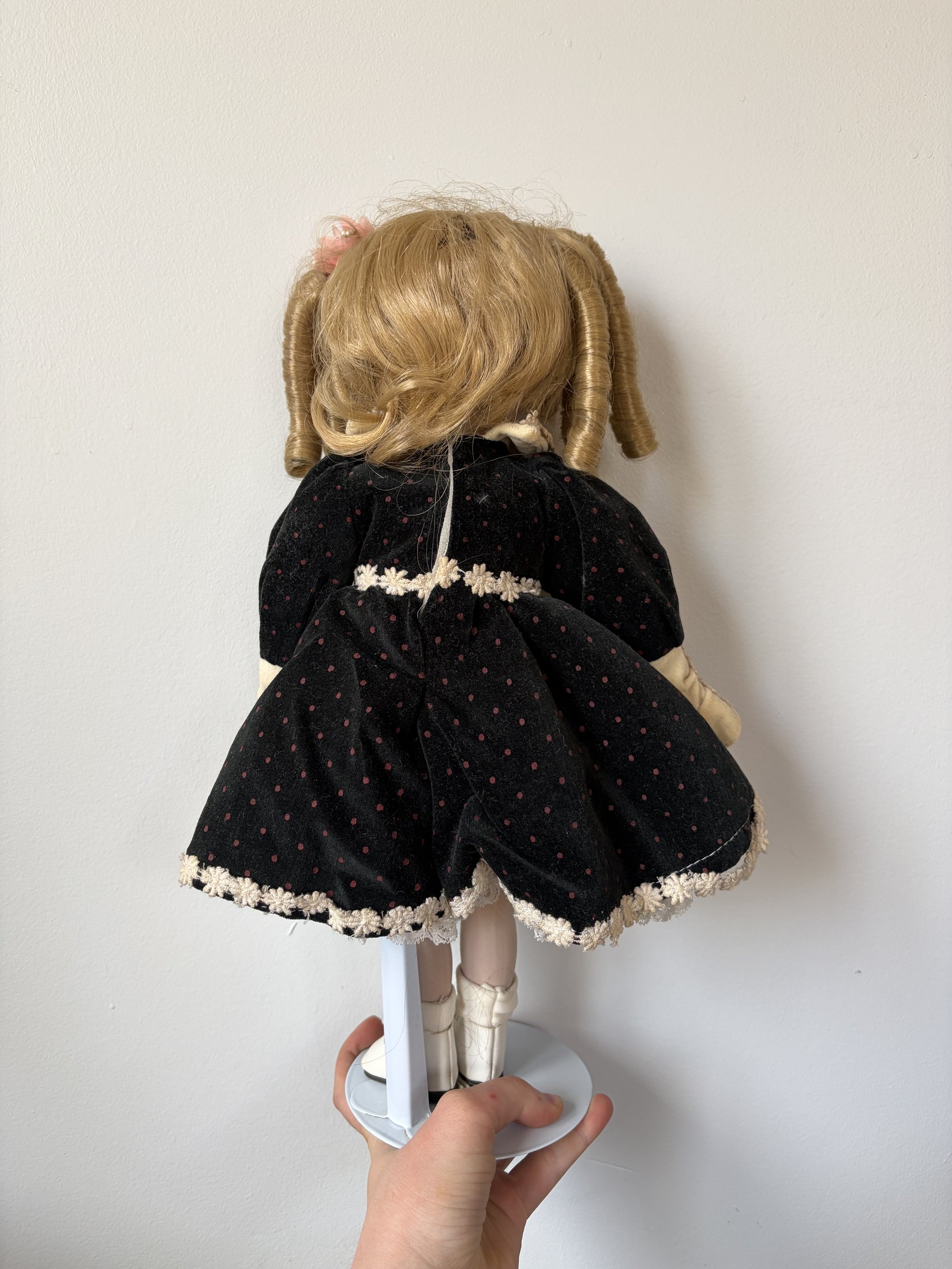 Vintage Porcelain Doll with Blonde Curls and Black Dress - Image 4