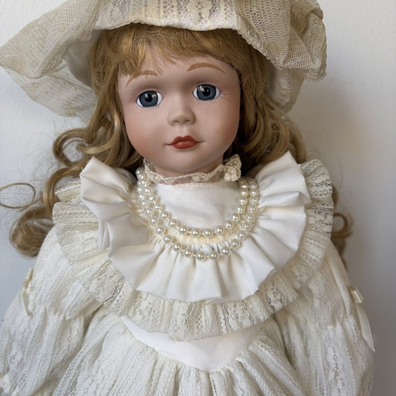Vintage Porcelain Doll in Ivory Lace Dress with Blonde Curls