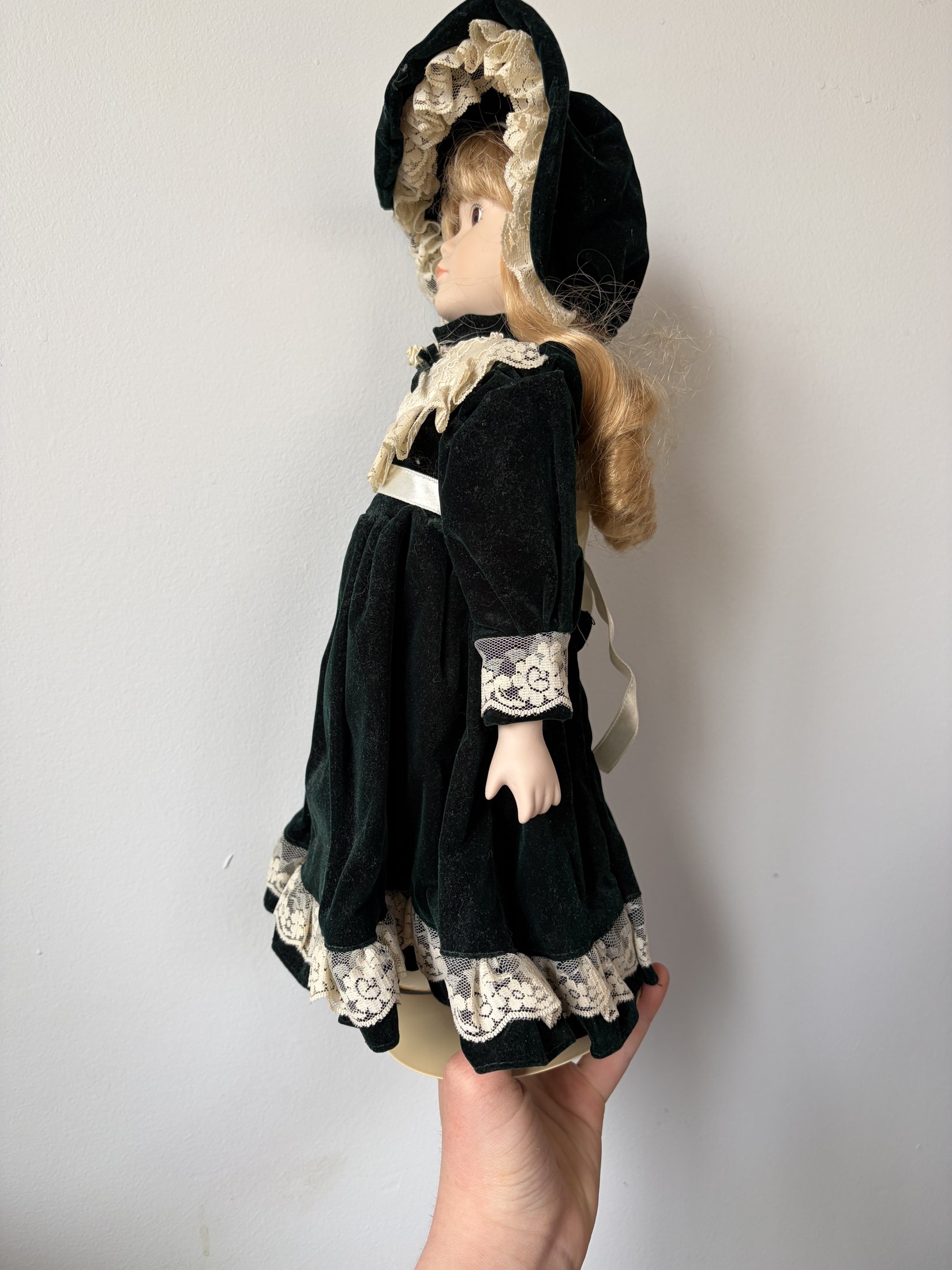 Ave Maria Porcelain Doll with Green Velvet Dress and Lace Trim - Image 5