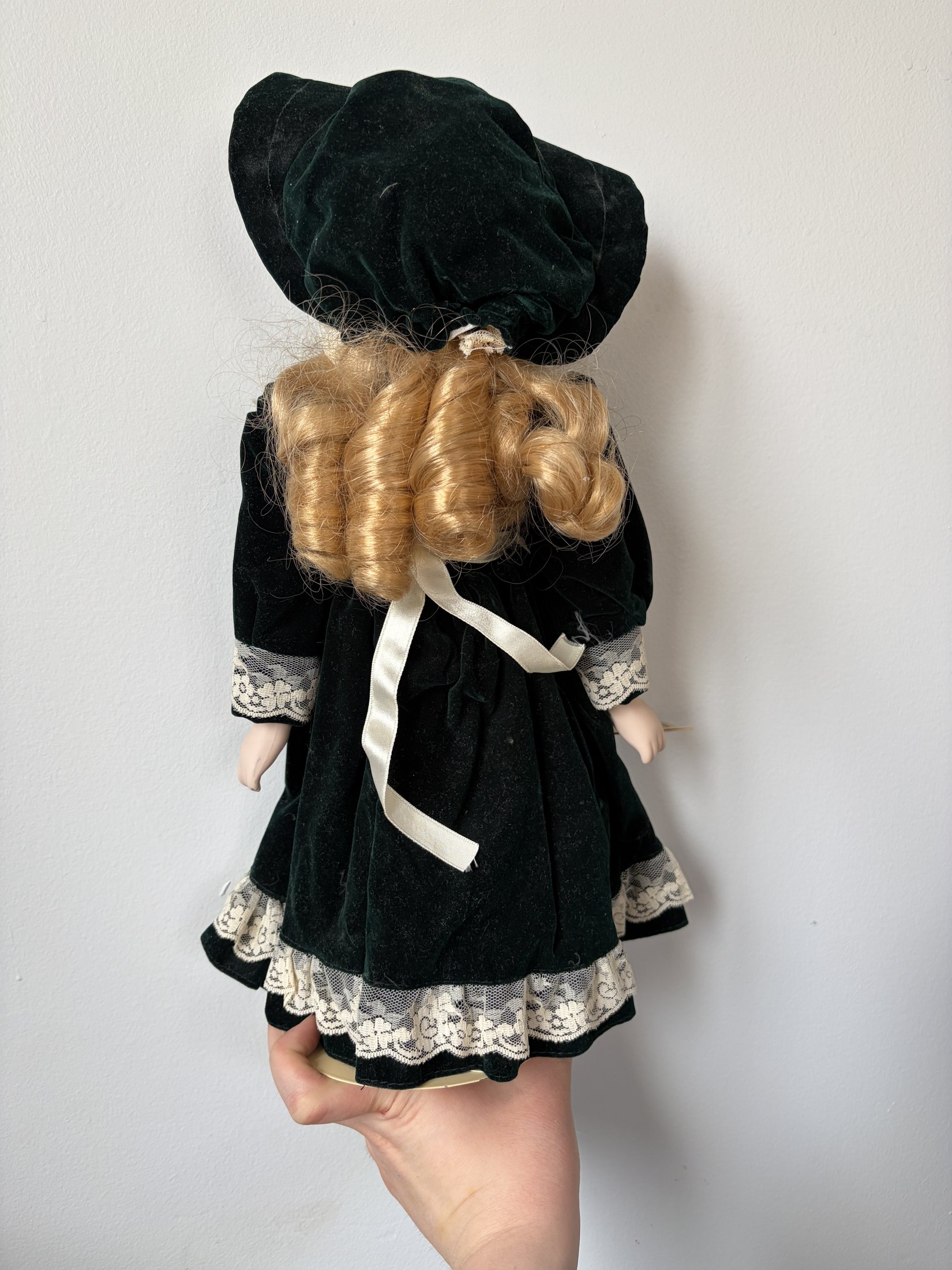 Ave Maria Porcelain Doll with Green Velvet Dress and Lace Trim - Image 4