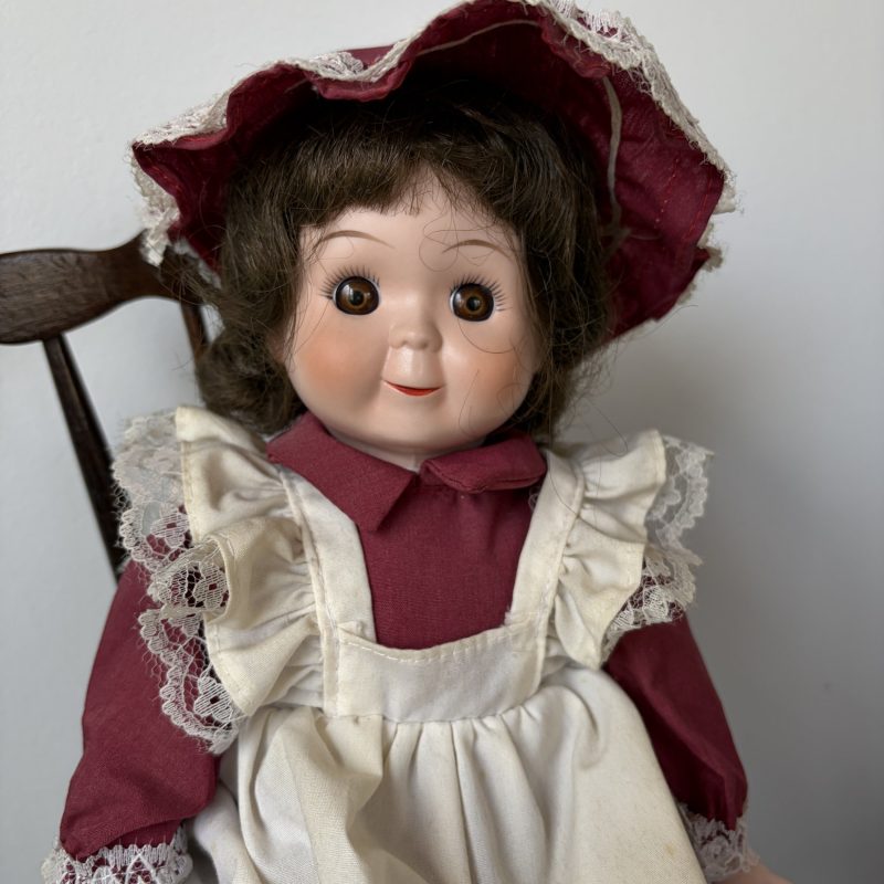 Vintage Porcelain Doll in Maroon Dress with Lace Trim