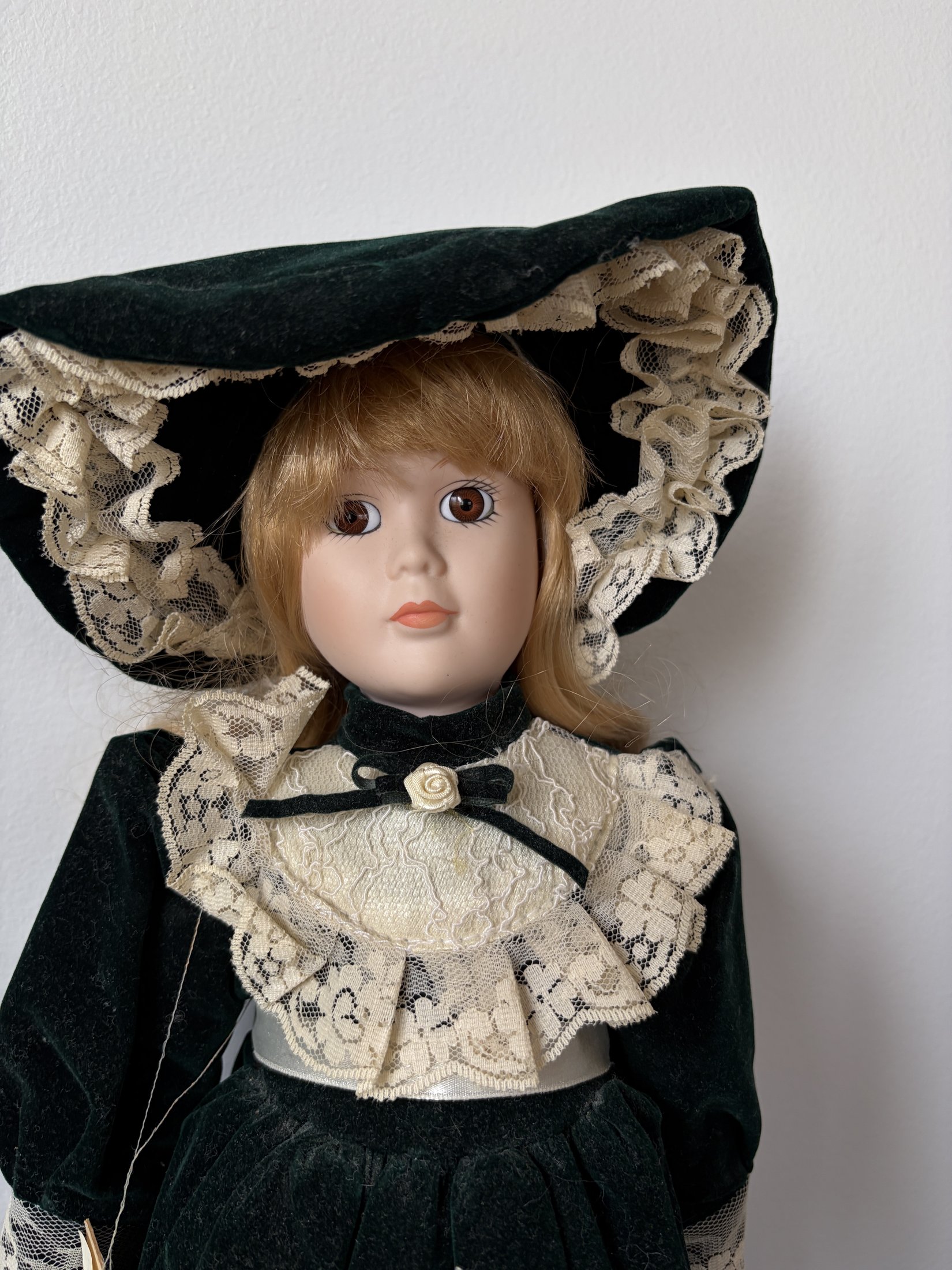 Ave Maria Porcelain Doll with Green Velvet Dress and Lace Trim